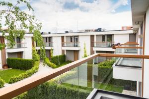 an apartment balcony with a view of a courtyard at Villa Atlantis Homes 2 in Burgas City