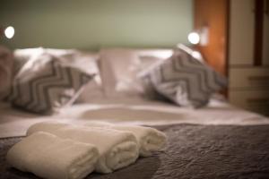 Posteľ alebo postele v izbe v ubytovaní Apartment Pax