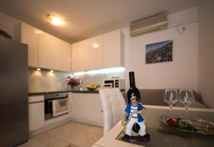 Kuchyňa alebo kuchynka v ubytovaní Apartment Pax