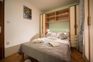 Posteľ alebo postele v izbe v ubytovaní Apartment Pax