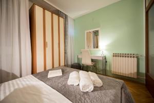 Posteľ alebo postele v izbe v ubytovaní Apartment Pax