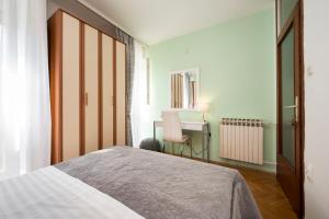 Posteľ alebo postele v izbe v ubytovaní Apartment Pax