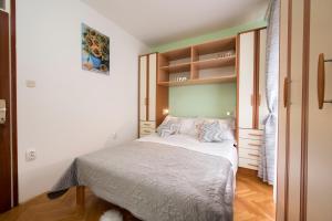 Posteľ alebo postele v izbe v ubytovaní Apartment Pax