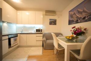 Kuchyňa alebo kuchynka v ubytovaní Apartment Pax