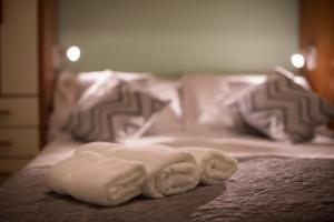Posteľ alebo postele v izbe v ubytovaní Apartment Pax