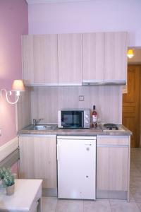 A kitchen or kitchenette at Nontas Home