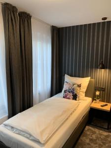 Postel nebo postele na pokoji v ubytování Hotel Dias