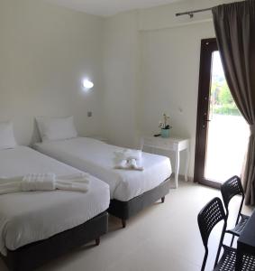 Postel nebo postele na pokoji v ubytování The Little Prince Luxury Suites