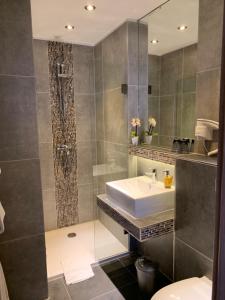 Koupelna v ubytování Hotel Dias