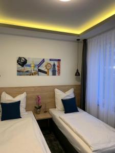 Postel nebo postele na pokoji v ubytování Hotel Dias