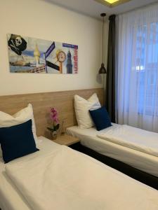 Postel nebo postele na pokoji v ubytování Hotel Dias