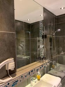 Koupelna v ubytování Hotel Dias