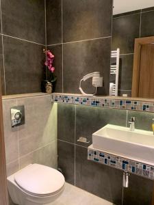 Koupelna v ubytování Hotel Dias