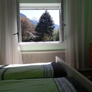 מיטה או מיטות בחדר ב-Villa Siebenruh