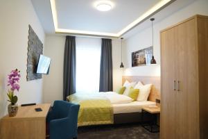 Postel nebo postele na pokoji v ubytování Hotel Dias