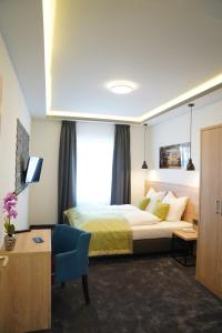Tempat tidur dalam kamar di Hotel Dias