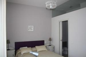 Posteľ alebo postele v izbe v ubytovaní Dimora Sabatini B&B