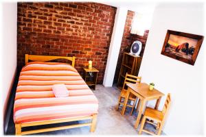 Postel nebo postele na pokoji v ubytování ATMA Hostel & Yoga