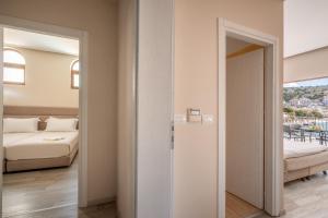 Postel nebo postele na pokoji v ubytování PALMA city HOTEL