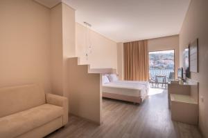 Postel nebo postele na pokoji v ubytování PALMA city HOTEL