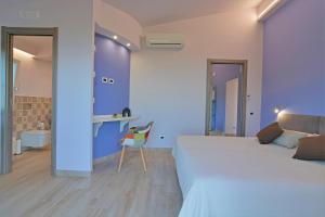 A bed or beds in a room at Villa Provenza