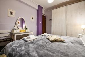 Кровать или кровати в номере Star Parthenon Apartment