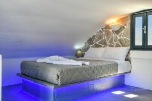 Postelja oz. postelje v sobi nastanitve Sun Springs Suites