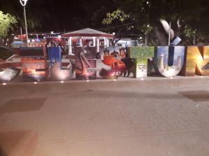 a group of vases on a street at night at Hotel San Julio in Celestún