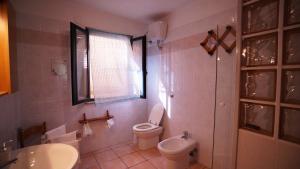 Koupelna v ubytování Residenza Su Prelau