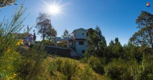 Zahrada ubytování Trippr Kodaikanal Backpacker Hostel + 10 fotografií