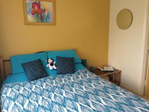 Krevet ili kreveti u jedinici u okviru objekta The Lazy Cow Accommodation