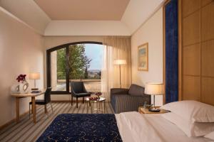 Letto o letti in una camera di Dan Jerusalem Hotel