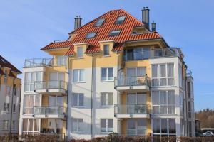 un condominio con tetto rosso di Windrose 7 a Grossenbrode