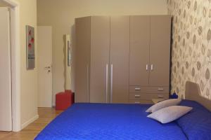 Postel nebo postele na pokoji v ubytování By Fralillo