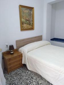 Postel nebo postele na pokoji v ubytování Casa Vall de Almonacid