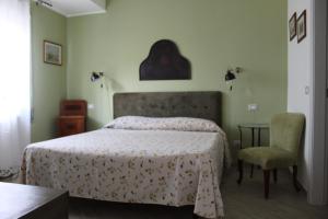 Postel nebo postele na pokoji v ubytování B&B Fleurs