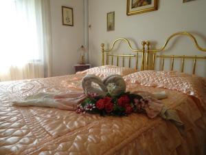 Postel nebo postele na pokoji v ubytování Le Mimose B&B