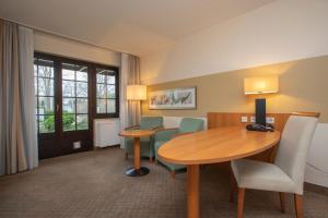 Posezení v ubytování Fletcher Hotel-Restaurant De Klepperman
