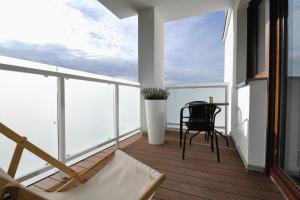 Balkón alebo terasa v ubytovaní Apartament RESORT Chełmońskiego Śrem