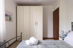 Łóżko lub łóżka w pokoju w obiekcie Luglie 360° panoramic terrace