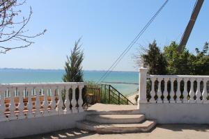 a white staircase with a view of the ocean at Sea 406 in Odesa