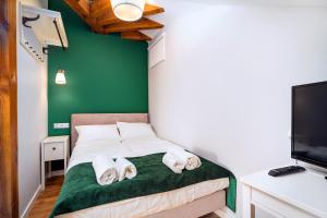 Łóżko lub łóżka w pokoju w obiekcie Apartment Zamojska 8 - Apartamenty GKM Lublin