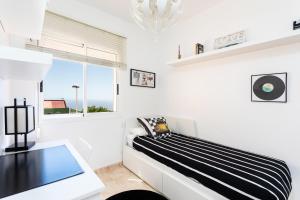 Posteľ alebo postele v izbe v ubytovaní Duplex Charco del Valle with Sea View