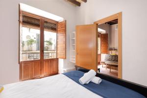 Ein Bett oder Betten in einem Zimmer der Unterkunft Urban Suites Granada