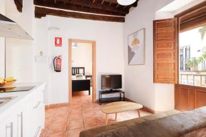 Ein Sitzbereich in der Unterkunft Urban Suites Granada