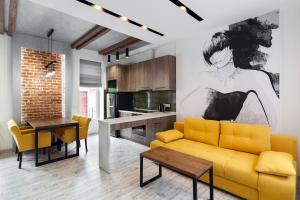 Kuchyňa alebo kuchynka v ubytovaní LEOGRAND LOFT Apartments on Lychakivska 4