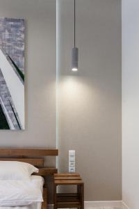 Posteľ alebo postele v izbe v ubytovaní LEOGRAND LOFT Apartments on Lychakivska 4