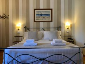 Ліжко або ліжка в номері Hotel David