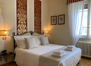 Ліжко або ліжка в номері Hotel David