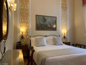 Ліжко або ліжка в номері Hotel David